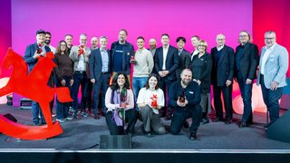 Gruppenfoto der ToyAward-Gewinner auf der Bühne.